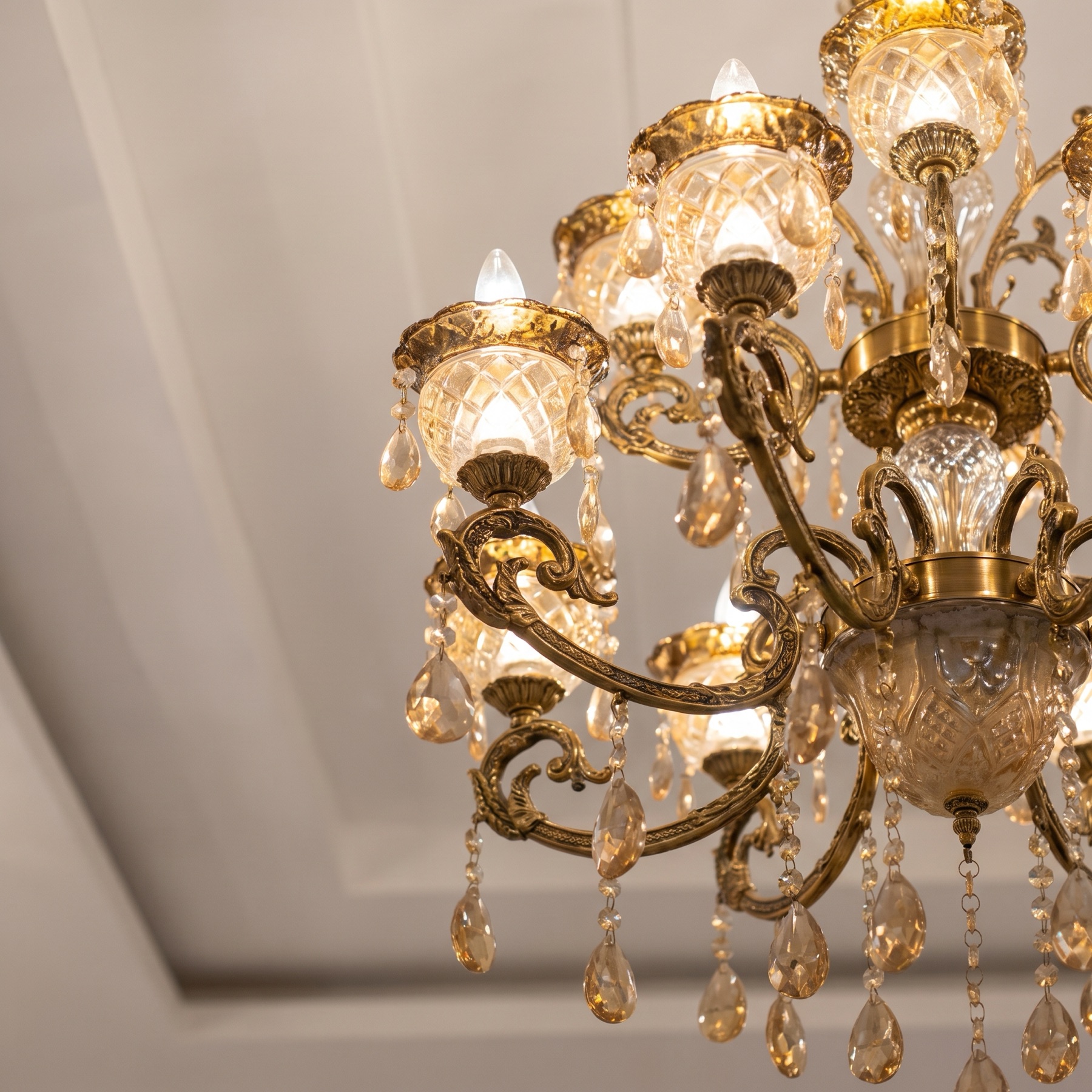 Brass and crystal chandelier detail in the great hall